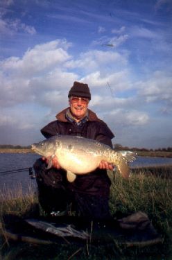 Jim with an Autumn carp caught at long range.